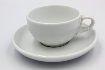 white coffee cup and saucer