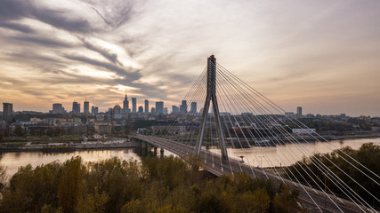 Aerial view of Warsaw at Swietokrzyski Bridge at Vistula river at dawn