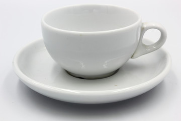 Obraz na płótnie Canvas empty coffee cup and saucer isolated on white background