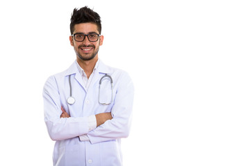 Young handsome bearded Persian man doctor with eyeglasses