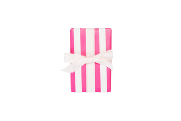 Fototapeta na wymiar Christmas or other holiday handmade present in pink paper with white ribbon. Isolated on white background, top view. thanksgiving Gift box concept