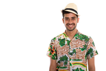 Young handsome bearded Persian tourist man ready for vacation