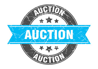 auction round stamp with turquoise ribbon. auction