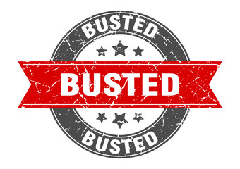 busted round stamp with red ribbon. busted