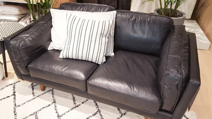 couch black living room with leather sofa with beige fashion cushion carpet at home house