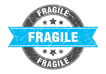 fragile round stamp with turquoise ribbon. fragile