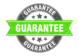 Obraz premium guarantee round stamp with green ribbon. guarantee