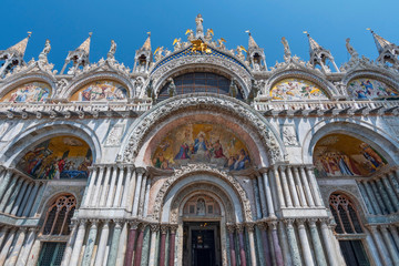 Fototapeta na wymiar Mosaic over entry doors to Basilica di San Marco, Piazza San Marco, Venice, Veneto, Italy.