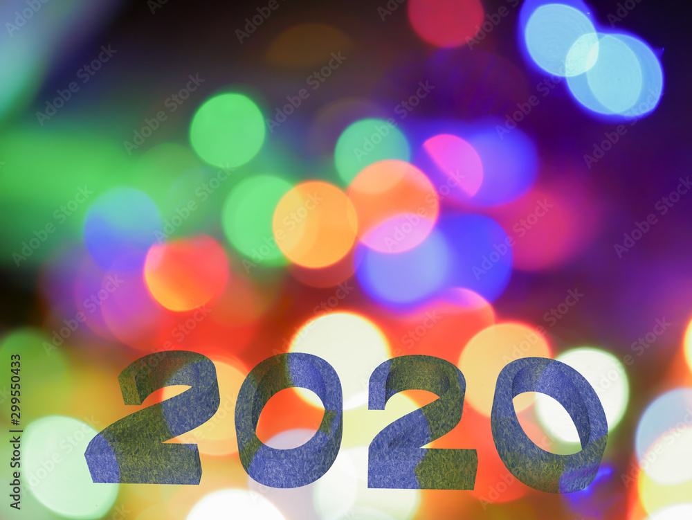 Poster 2020 new year the bokeh blur background image from a blurred light.