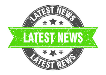latest news round stamp with green ribbon. latest news