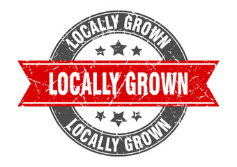 locally grown round stamp with red ribbon. locally grown