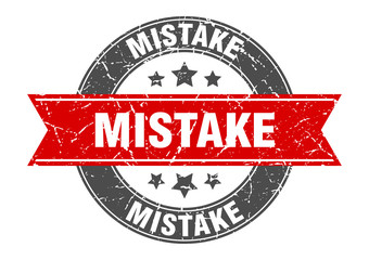 mistake round stamp with red ribbon. mistake