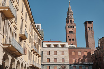 Fototapeta premium view of buildings and Cathedral with the adjoining baptistery and famous Torrazzo bell tower- Lombardy, Italy