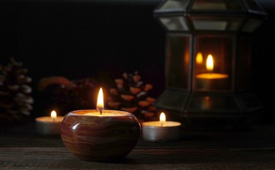 candle burning decoration as Christmas festival greeting  P By Phuangphet geissler