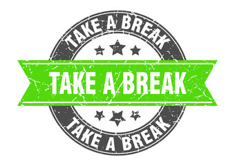take a break round stamp with green ribbon. take a break
