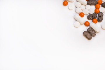 pills and tablets on white background