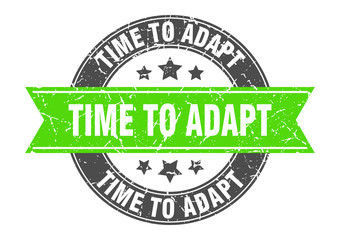 time to adapt round stamp with green ribbon. time to adapt