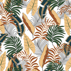 Summer seamless tropical pattern with bright yellow and green leaves and plants on white background. Seamless exotic pattern with tropical plants. Exotic jungle wallpaper. 