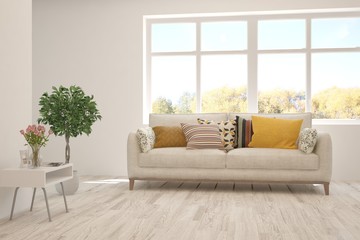 Stylish room in white color with sofa and autumn landscape in window. Scandinavian interior design. 3D illustration