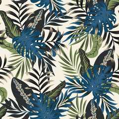 Abstract seamless tropical pattern with bright green and blue leaves and plants on a light background. Seamless exotic pattern with tropical plants. Beautiful seamless vector floral pattern.