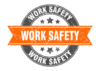 work safety round stamp with orange ribbon. work safety