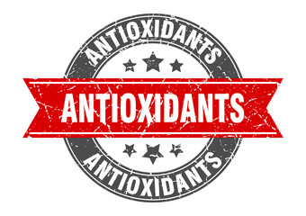 antioxidants round stamp with red ribbon. antioxidants