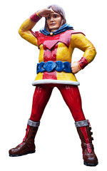 A toy of a tall man in colored clothes stands with his legs wide apart and looks into the distance