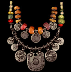Vector Jewelry. Coral Ethnic Necklaces. Black Background.