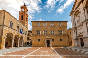 Pio II square with Town Hall, Bishop Palace and Cathedral, Pienza, Italy. - 299558098