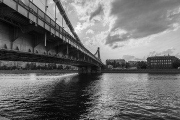 landscape with river and bridge in black and white