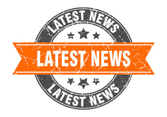 latest news round stamp with orange ribbon. latest news