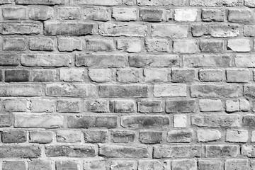 Dark old bricks wall surface abstract pattern background. Background of old vintage brick wall