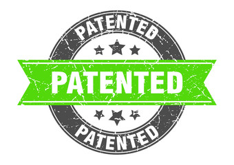 patented round stamp with green ribbon. patented