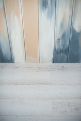 wooden background with colored stripes. two materials