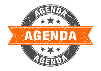 agenda round stamp with orange ribbon. agenda