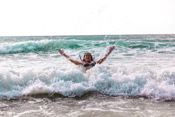 Girl have fun on the waves