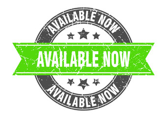 available now round stamp with green ribbon. available now