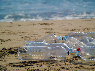 Fototapeta na wymiar Plastic bottles at the beach, recycle, reduce and reuse