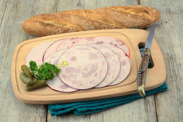 ham roll on a cutting board