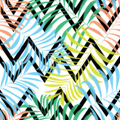 Seamless pattern with colorful palm leaves on black striped zigzag background