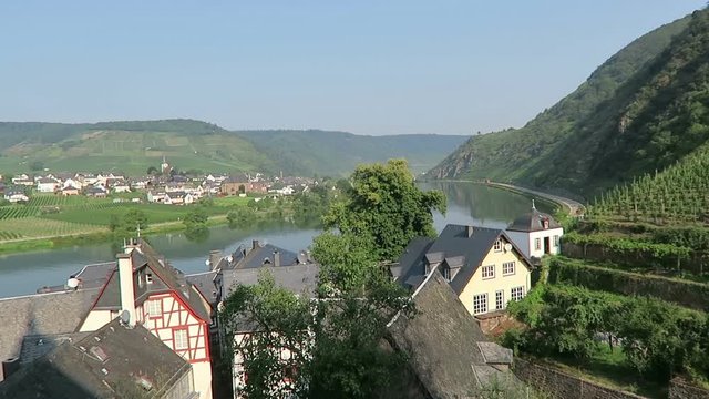 Cityscape of Beilstein at Moselle river. Boats on riving.