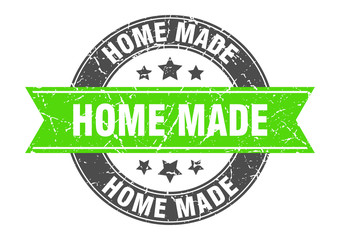 home made round stamp with green ribbon. home made