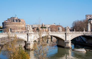 Ponte Sant'Angelo with the Castel Sant'Angelo in the background, Rome, Italy. Buildings completed in 134 AD by Roman Emperor Hadrian to span the Tiber, from the city center to his mausoleum.