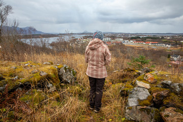 Happy walking woman in Skarsåsen,Brønnøy,Nordland county