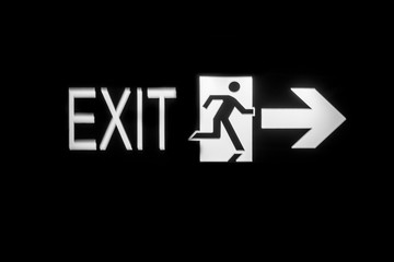 exit sign on black background, security