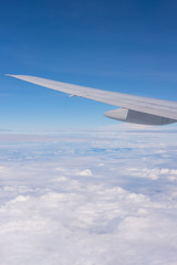 Fototapeta na wymiar Wing aircraft with sky background