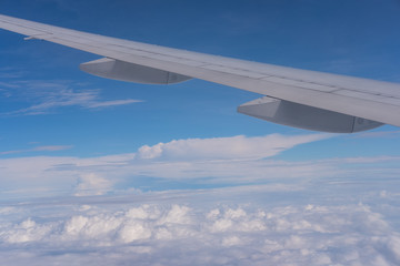 Fototapeta na wymiar Wing aircraft with sky background