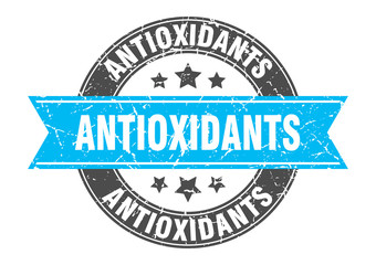 antioxidants round stamp with turquoise ribbon. antioxidants