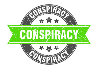 conspiracy round stamp with green ribbon. conspiracy