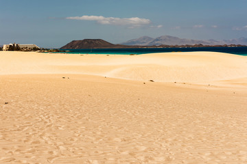 Fototapeta na wymiar Corralejo in the north of Fuerteventua. The islands of Lobos and Lanzarote can be seen in the distance.